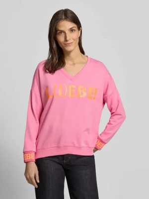 Bluza o kroju oversized z nadrukiem z napisem Miss Goodlife Różowy