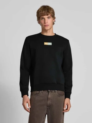 Bluza o kroju regular fit z nadrukiem z logo model ‘Pan’ jack & jones