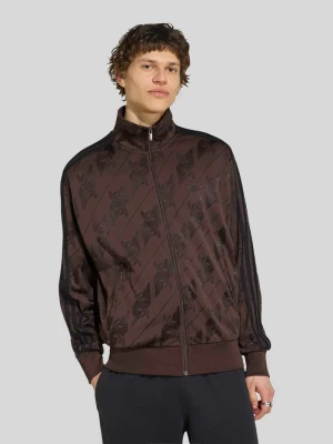 bluza rozpinana o kroju relaxed fit z nadrukiem z logo na całej powierzchni model 'FIREBIRD' adidas Originals