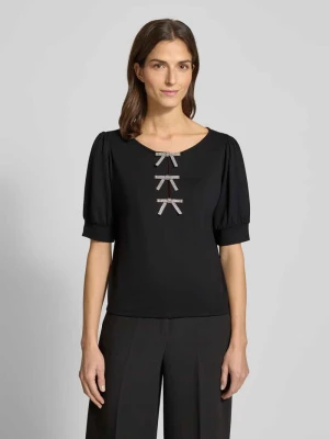 Bluza z bufiastymi rękawami i wiązane aplikacje monari