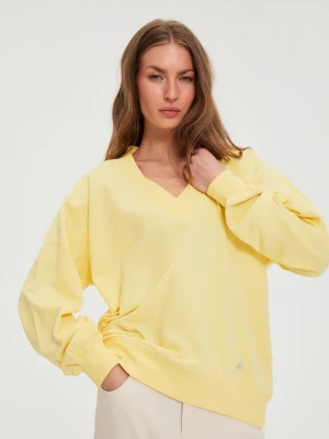 Zdjęcie produktu Bluza z dekoltem w serek żółta Moodo