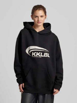 Bluza z kapturem o kroju oversized z nadrukiem z logo Karo Kauer