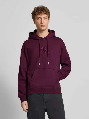 Bluza z kapturem o kroju regular fit i naszywką z logo model ‘Fleece’ Calvin Klein Jeans