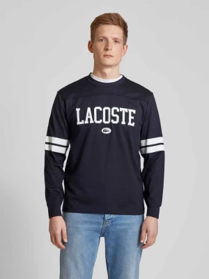 Bluzka o kroju classic fit z długim rękawem i nadrukiem z logo Lacoste
