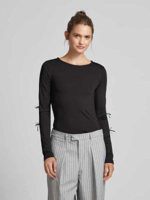 Zdjęcie produktu Bluzka o kroju regular fit z długim rękawem i kokardkami model ‘SELINA’ Pieces