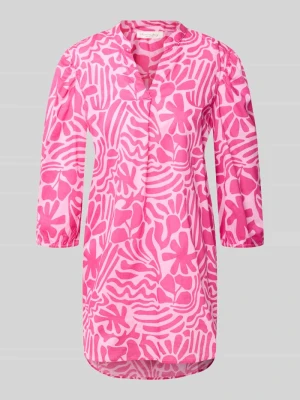 Bluzka tunika o kroju relaxed fit z kwiatowym nadrukiem na całej powierzchni Christian Berg Woman