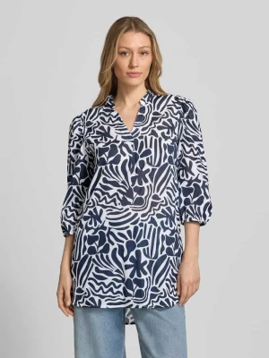 Bluzka tunika o kroju relaxed fit z kwiatowym nadrukiem na całej powierzchni Christian Berg Woman