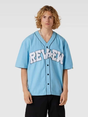 Bluzka w stylu varsity z nadrukiem w stylu college z imitacji futerka REVIEW