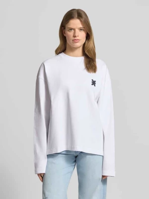 Bluzka z długim rękawem o kroju oversized z tylnym nadrukiem z napisem Karo Kauer