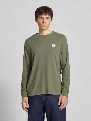 Bluzka z długim rękawem o kroju regular fit z mieszanki bawełny Calvin Klein Jeans