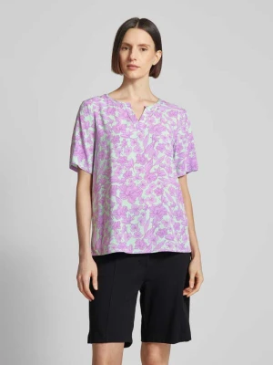 Bluzka z kwiatowym wzorem i dekoltem w serek montego