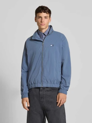 Bluzon o kroju regular fit ze stójką Tommy Jeans