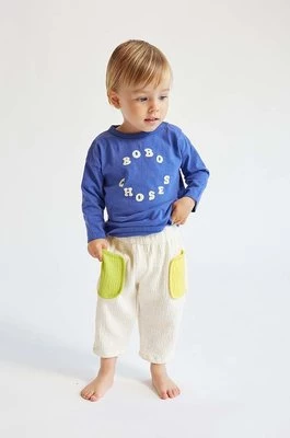 Bobo Choses spodnie bawełniane niemowlęce kolor beżowy wzorzyste