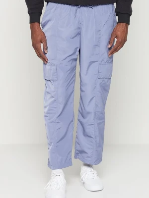 Bojówki adidas Originals fioletowy