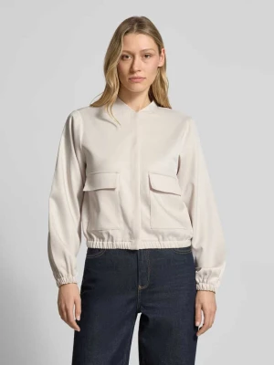 Bomberka z satyny z kieszeniami z patkami monari