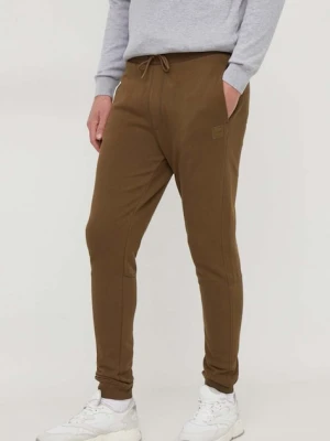 Zdjęcie produktu BOSS Orange spodnie dresowe bawełniane kolor zielony melanżowe