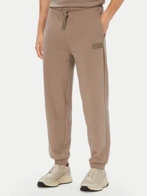 BOSS Spodnie dresowe JT_Long 50564096 Beżowy ciemny Relaxed Fit