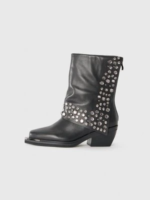 Botki kowbojki i motocyklowe Alma en Pena