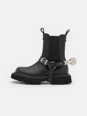 Botki kowbojki i motocyklowe Moschino