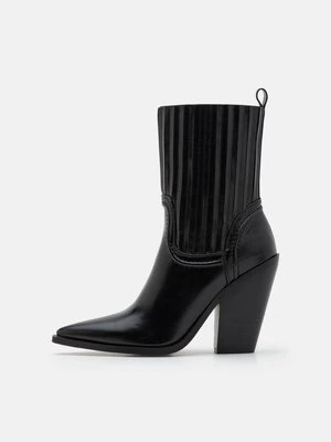 Botki kowbojki i motocyklowe Simmi London