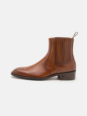 Botki kowbojki i motocyklowe Steve Madden