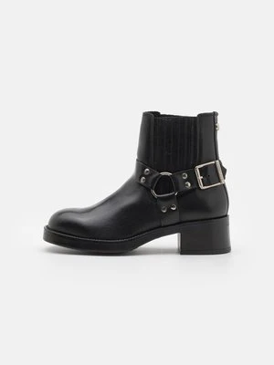 Botki kowbojki i motocyklowe Steve Madden