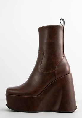 Botki na koturnie Jeffrey Campbell