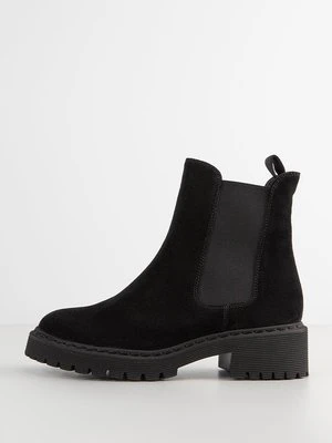 Botki na platformie Högl