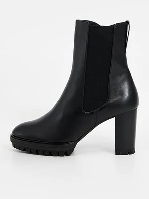 Botki na platformie Högl