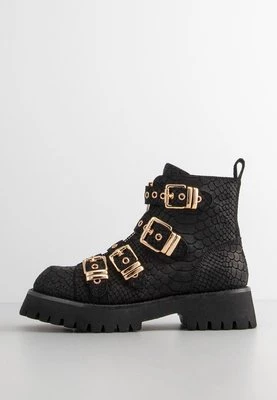 Botki na platformie Jeffrey Campbell