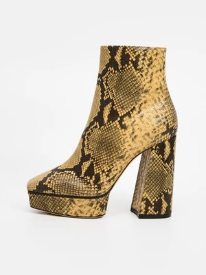 Botki na platformie Jimmy Choo