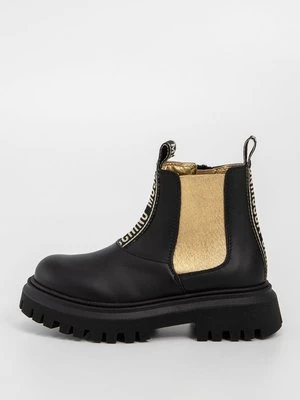 Botki na platformie Moschino