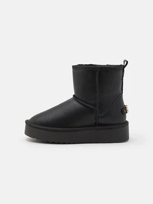 Botki na platformie Steve Madden