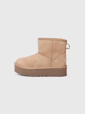Botki na platformie Ugg
