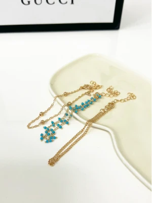 Bransoletki z koralikami - złote  magmac 