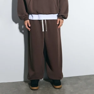 Brązowe spodnie dresowe super baggy fit basic House