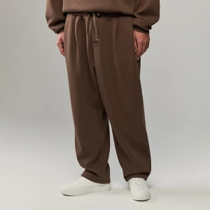 Brązowe spodnie dresowe super baggy z naszywką House