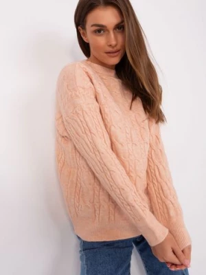 Brzoskwiniowy damski sweter z warkoczami