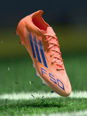 Buty piłkarskie na sztuczną trawę Adidas pomarańczowy