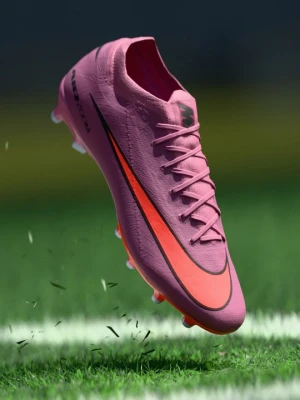 Buty piłkarskie na sztuczną trawę Nike morelowy