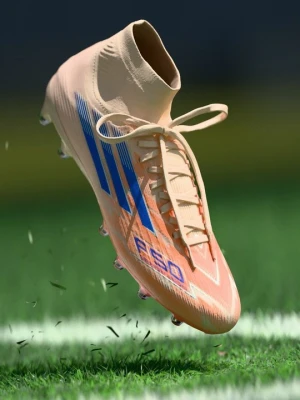 Buty piłkarskie na twardą nawierzchnię Adidas pomarańczowy