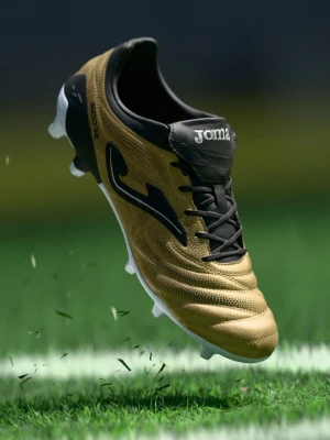 Buty piłkarskie na twardą nawierzchnię Joma w kolorze złota