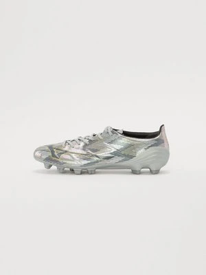 Buty piłkarskie na twardą nawierzchnię Mizuno