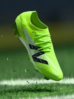 Buty piłkarskie na twardą nawierzchnię New Balance jasnozielony