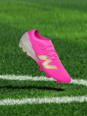 Buty piłkarskie na twardą nawierzchnię New Balance różowy