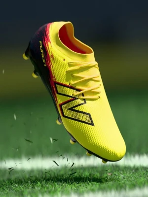 Buty piłkarskie na twardą nawierzchnię New Balance żółty
