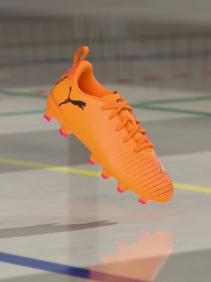Buty piłkarskie na twardą nawierzchnię Puma pomarańczowy