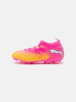 Buty piłkarskie na twardą nawierzchnię Puma różowy neon