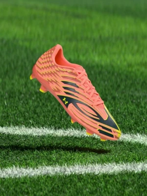 Buty piłkarskie na twardą nawierzchnię Under Armour łososiowy