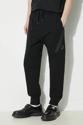 C.P. Company spodnie dresowe bawełniane Diagonal Raised Fleece kolor czarny gładkie 16CMSP084A005086W